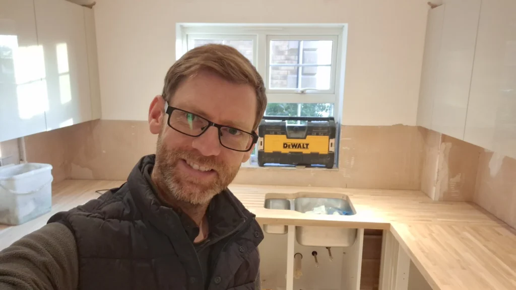 installing oak worktop in a modern kitchen