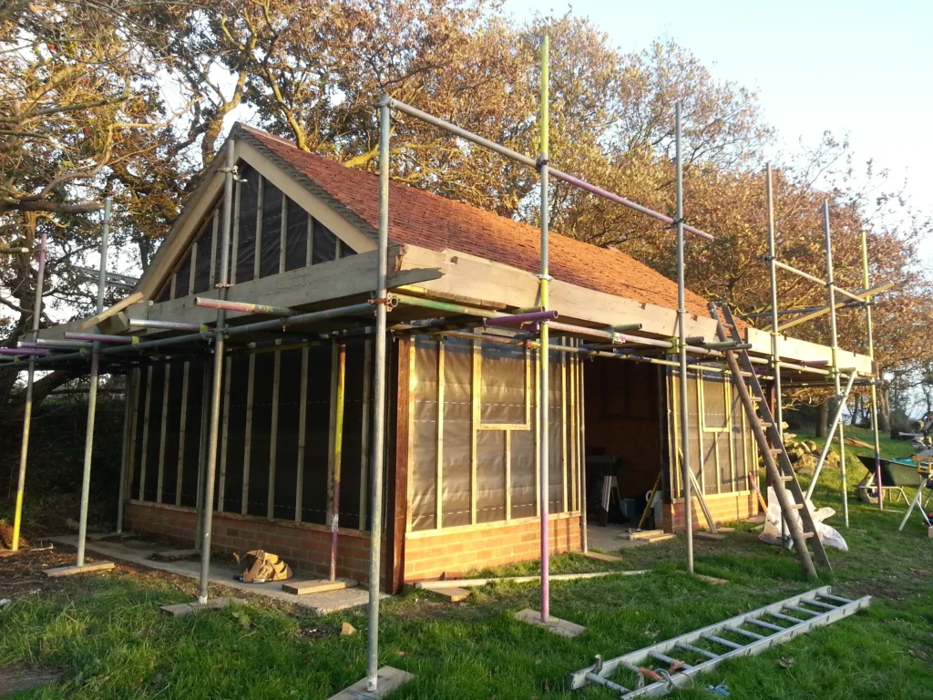 The outbuilding during construction, showing the breather membrane and counter batten completed